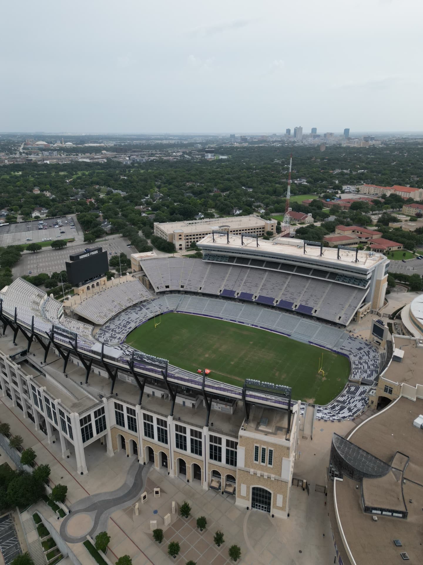 Overhead vertical aerial of Amon G. Carter Stadium at TCU in Fort Worth showing full bowl and football field from directly above
